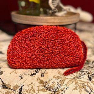 Red beaded wristlet bag